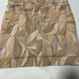 Democracy Leaf Pattern Mini Skirt in Tan and Green